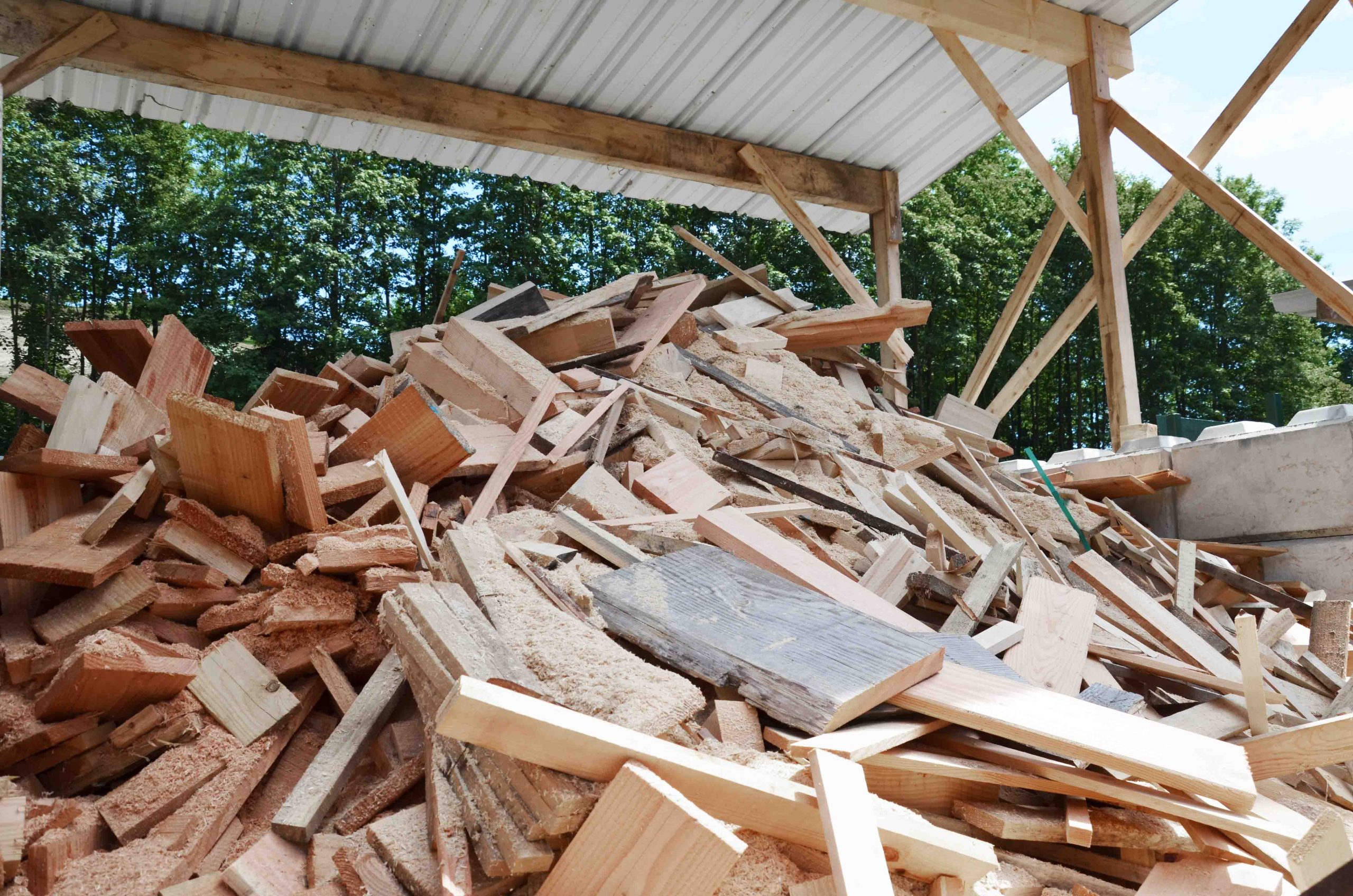 A pile of demolition wood before the shredding process