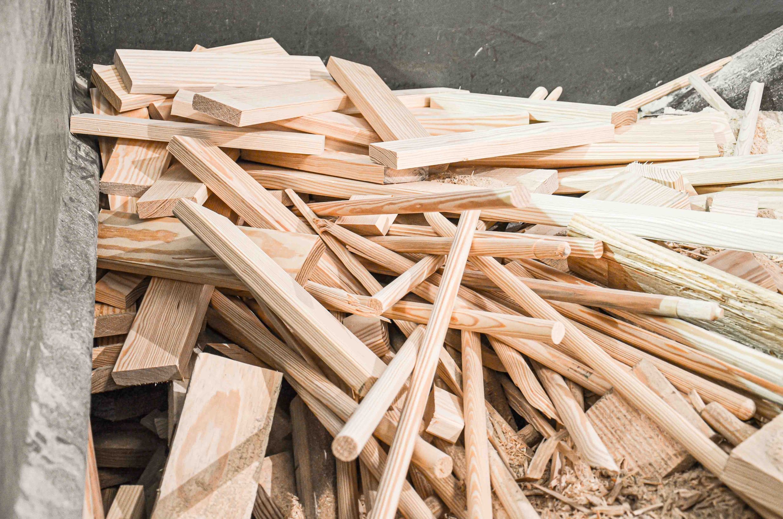 Wood scrap like broom handles and other wood waste