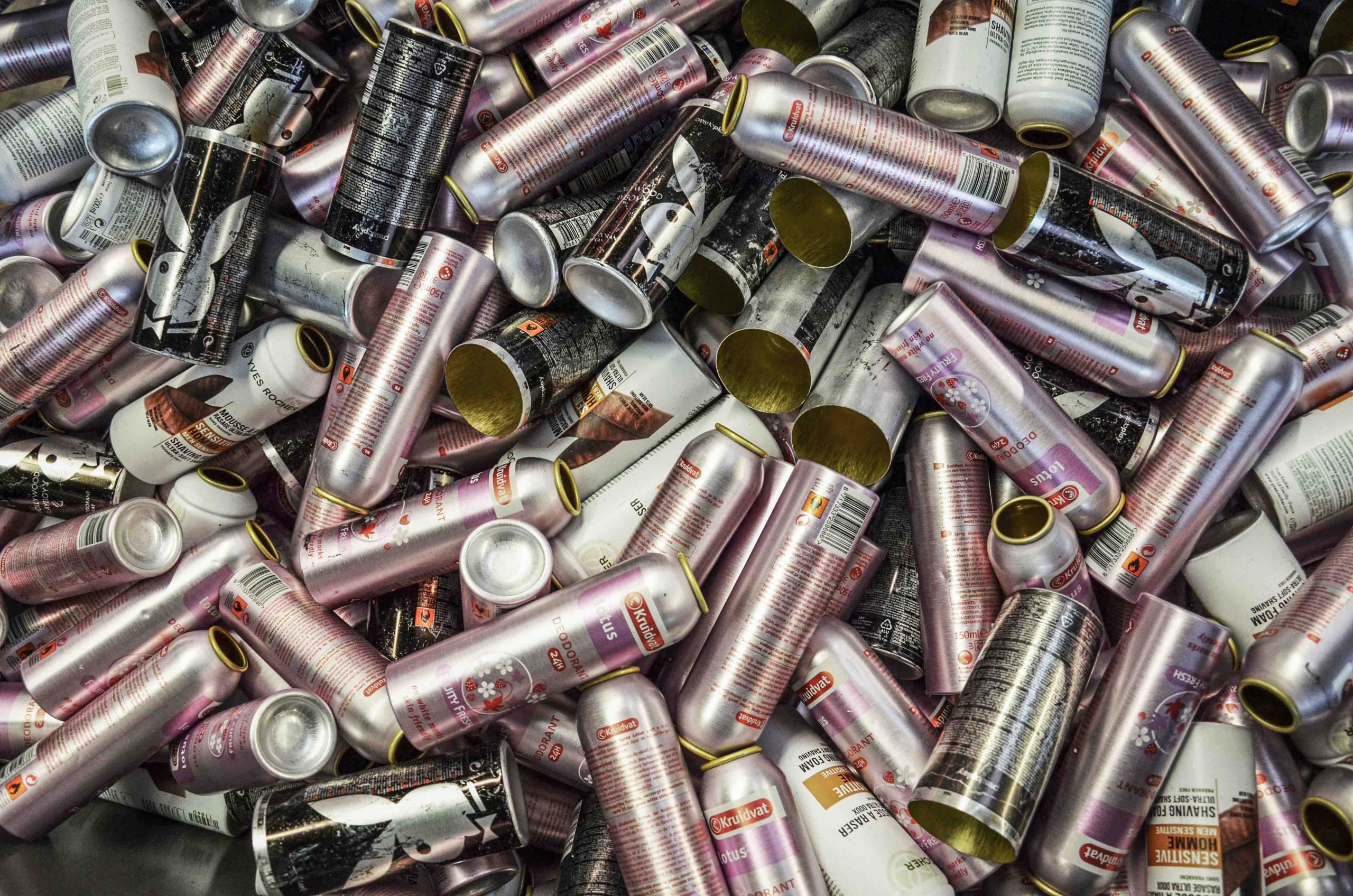 Deodorant cans in a pile