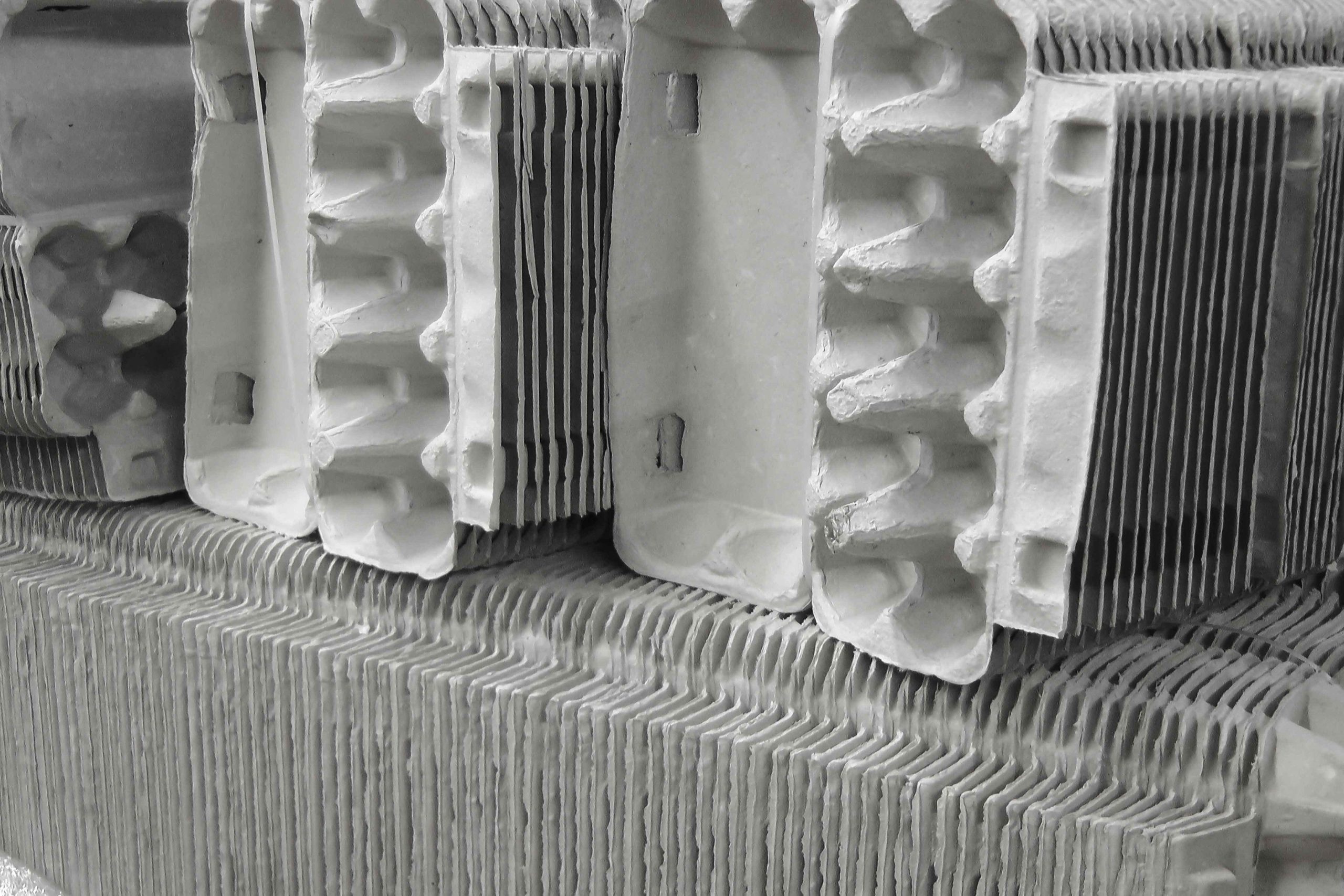 Scrap from egg carton production can be recycled in-house with a WEIMA shredder.