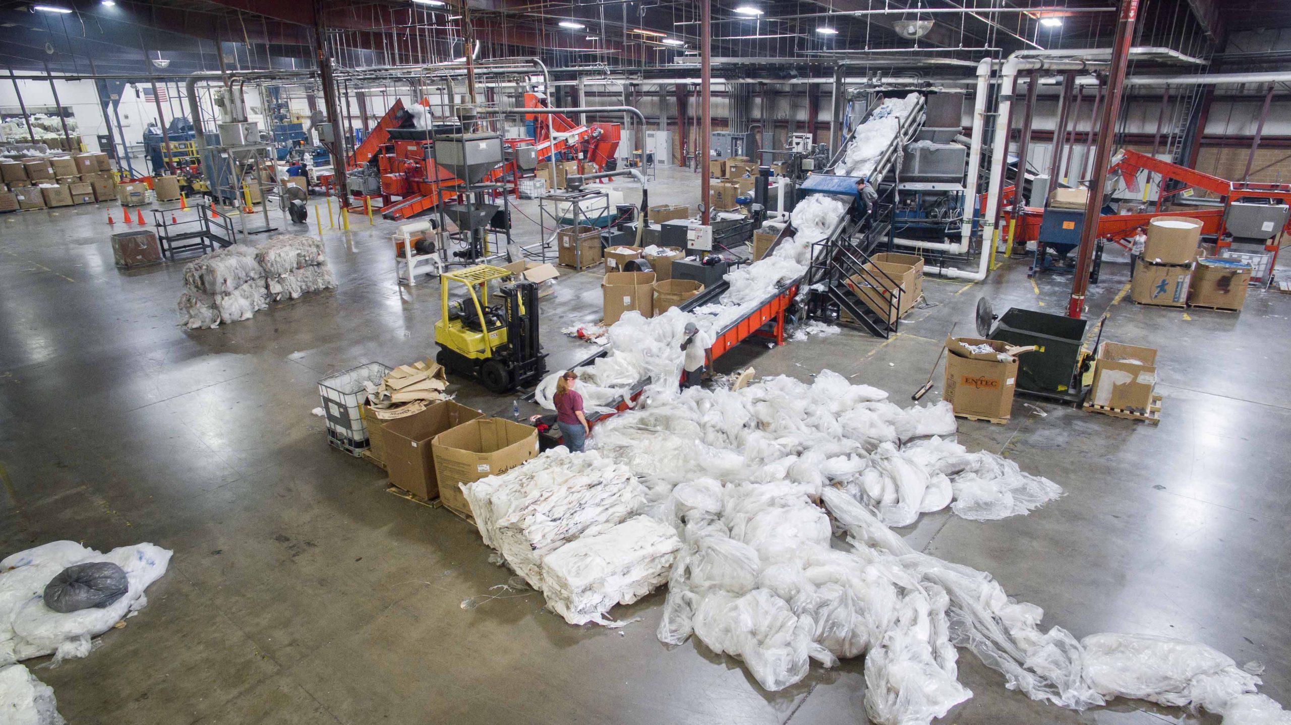 Film waste is shredded in a large plant with WEIMA shredder for recycling