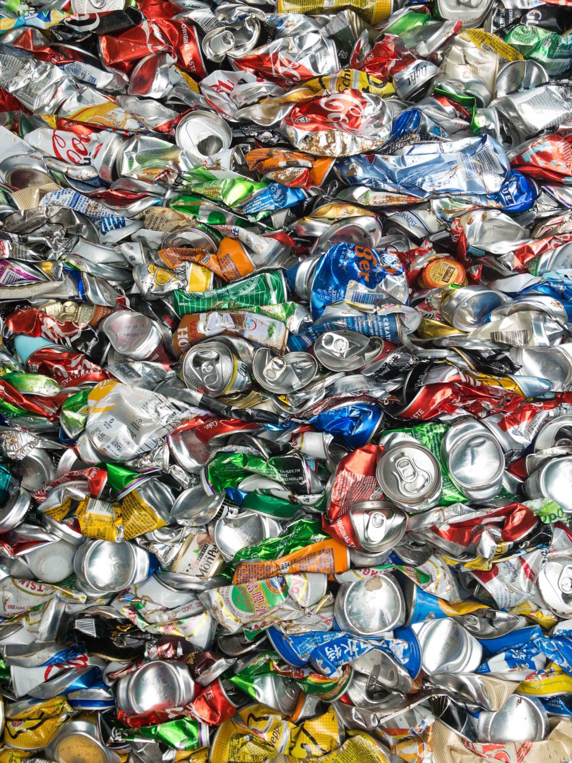 Compressed aluminum cans for recycling