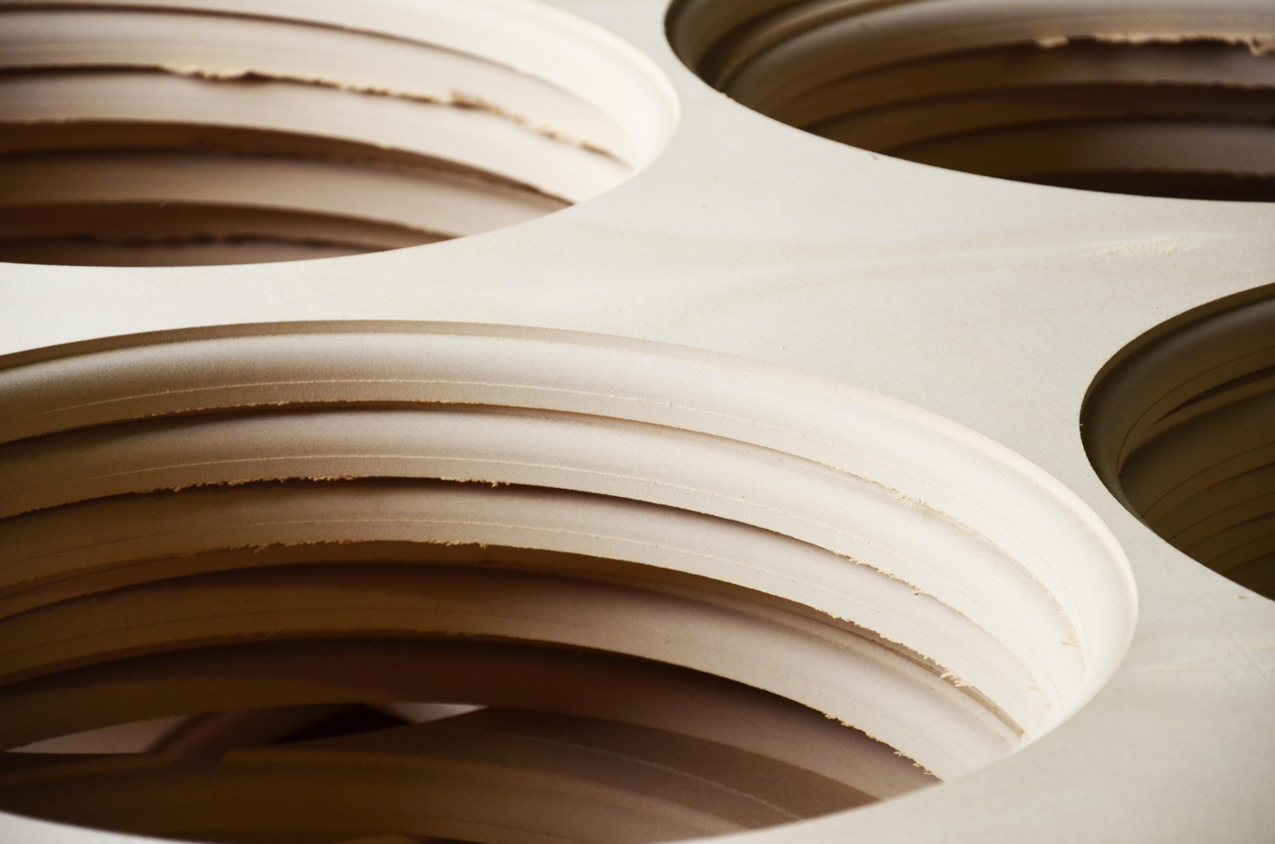 Wood scrap like MDF boards with punched holes