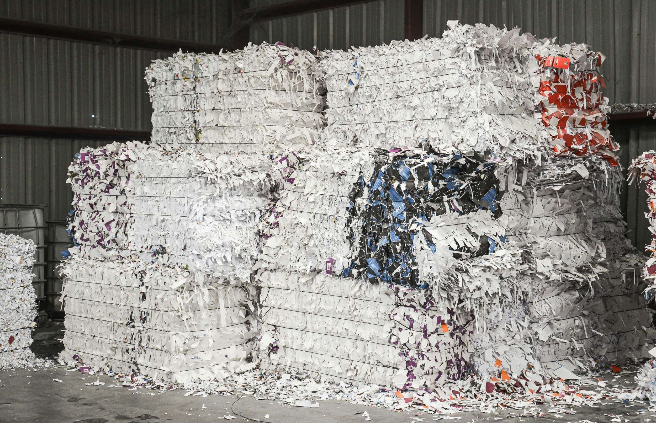 Paper bales before shredding