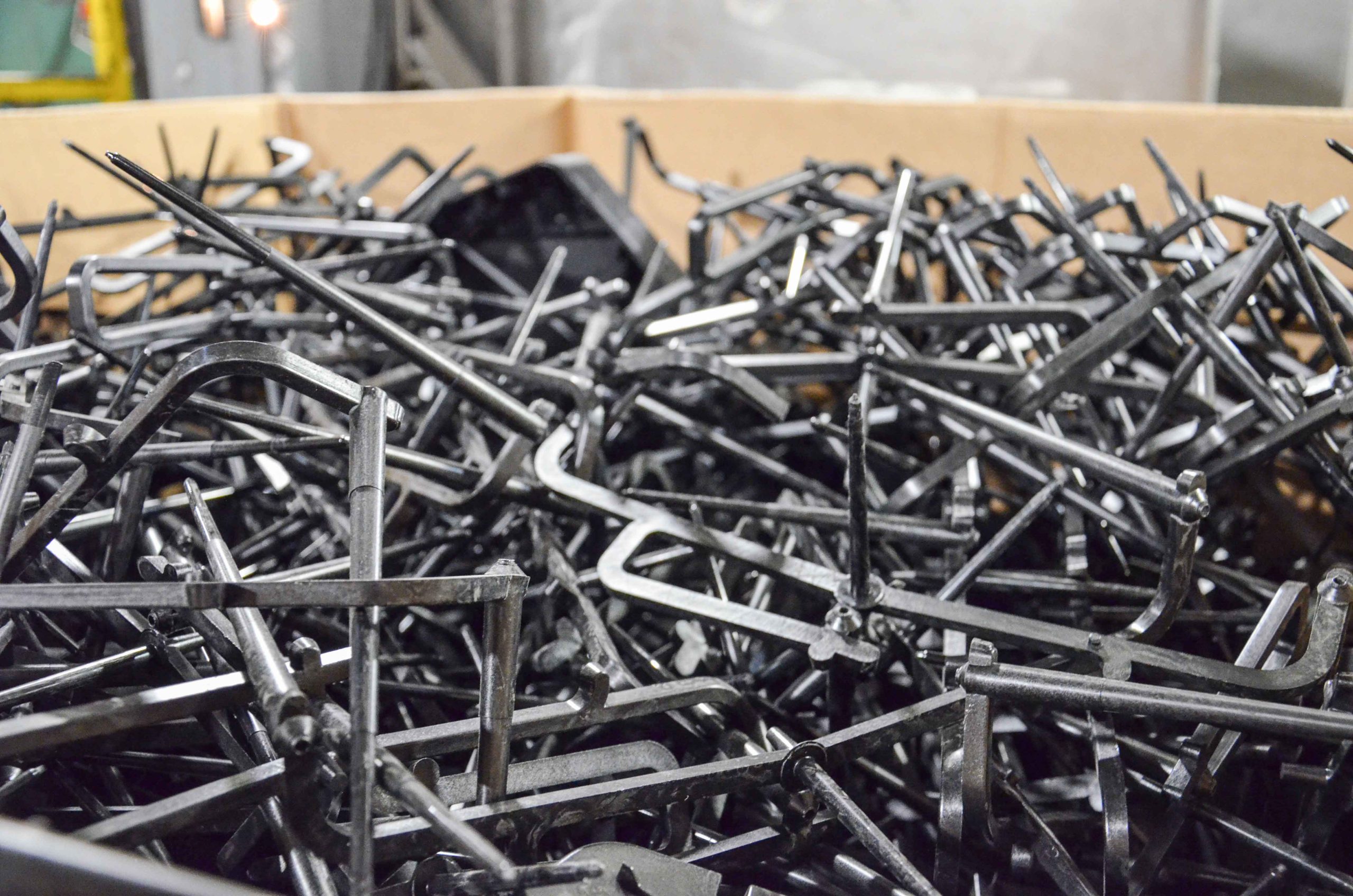 Injection moulding waste is stored in boxes until shredding