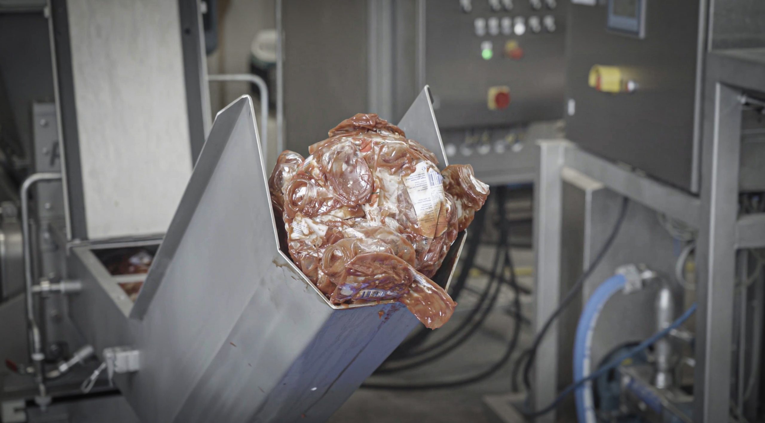 Compacted bottles of ketchup leave PUEHLER press