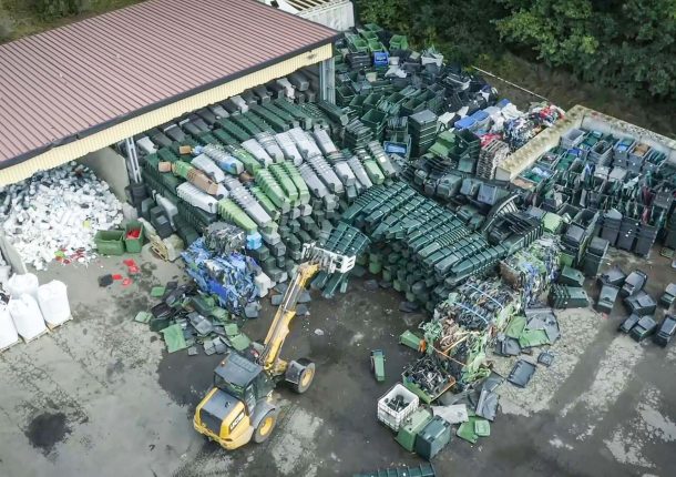 Material storage from old waste garbage cans, HDPE pipes and soiled hard plastic waste