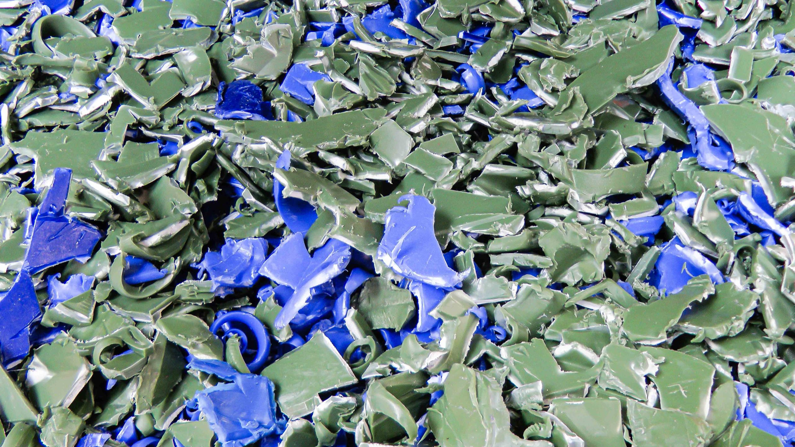 Shredded rigid hard plastic containers
