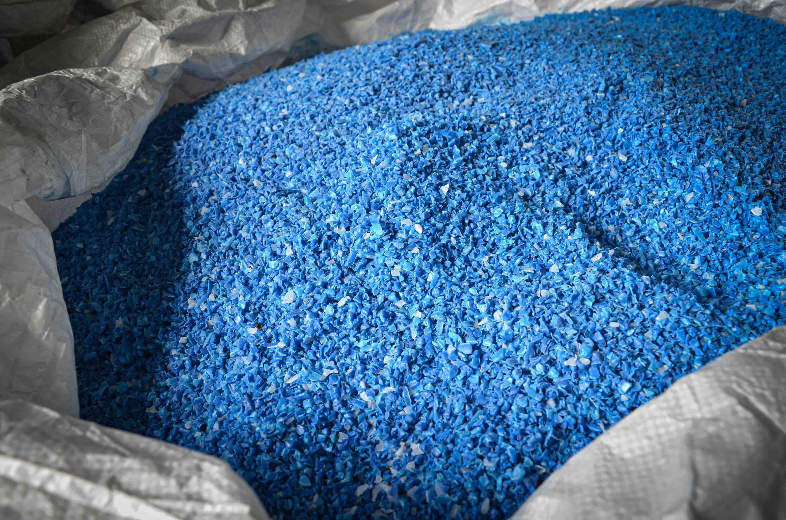 Shredded rigid plastic trash cans