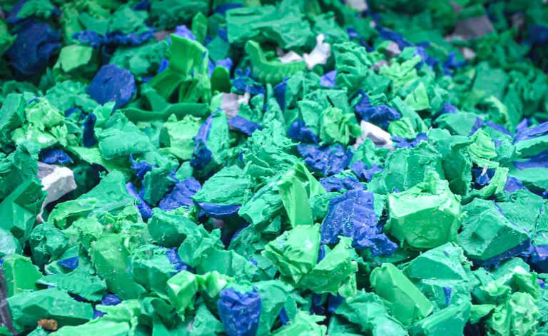 Plastic flakes form HDPE pipe shredding