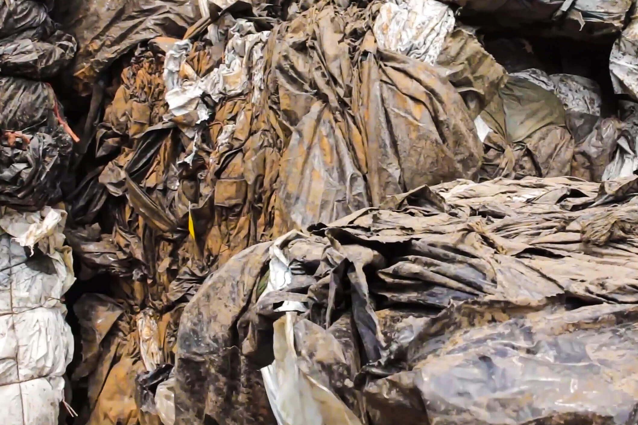 Baled agricultural film before shredding and recycling