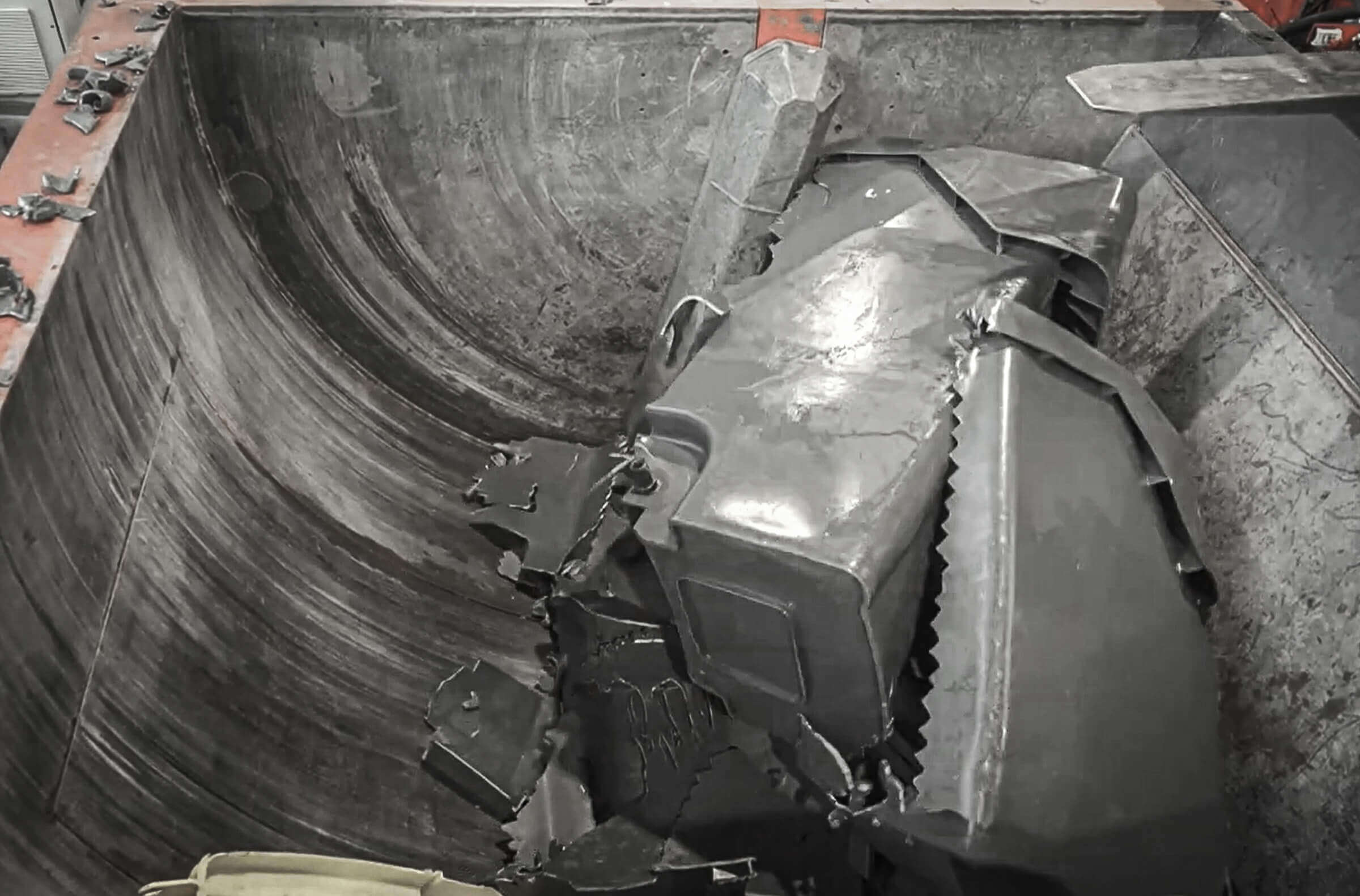 Plastic trash container shredder