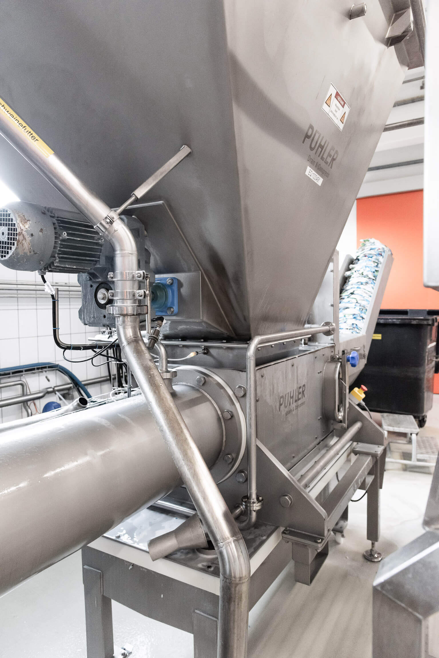 WEIMA drainage press for milk cartons at Emmi in Suhr, Switzerland