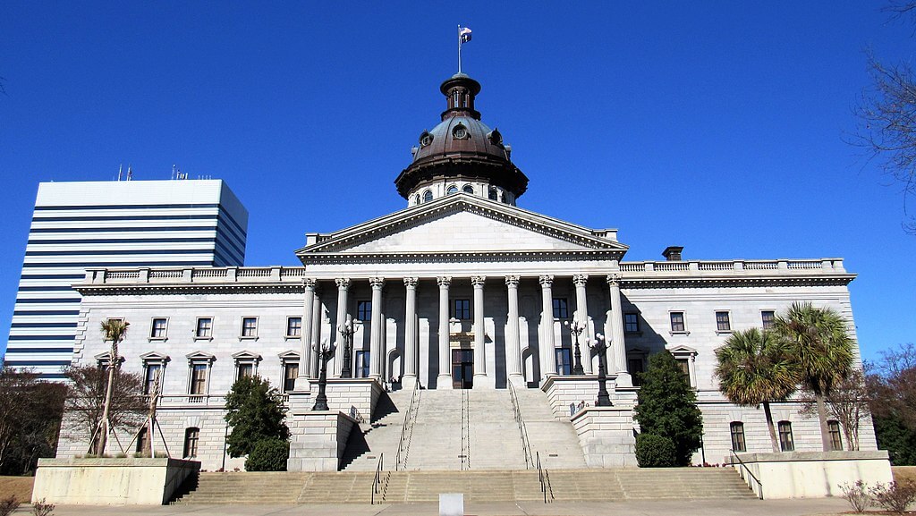 Photo of the South Carolina Statehouse from the front steps, Photo credit: Farragutful, CC BY-SA 4.0 , via Wikimedia Commons