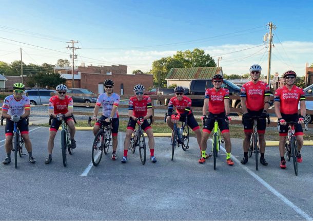 Velocity Cycling team members on their bicycles