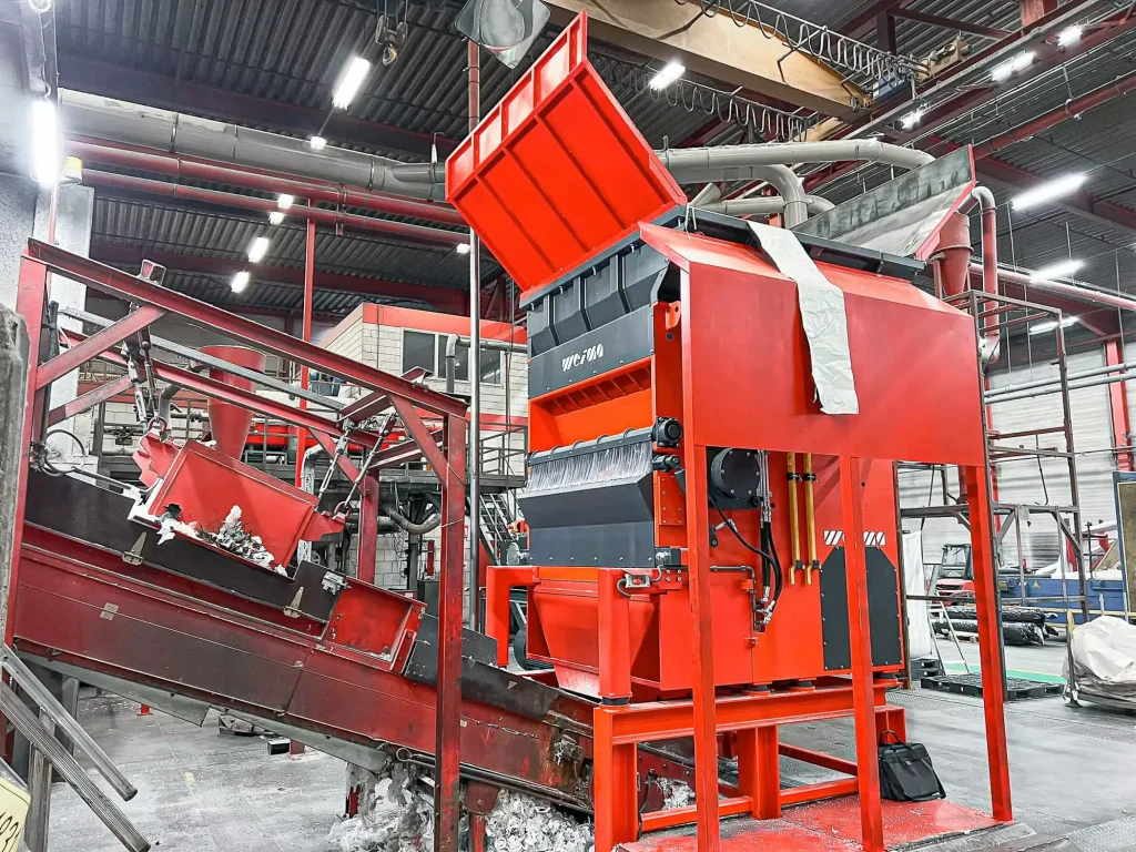 orange red weima shredder with conveyor belts in belgium