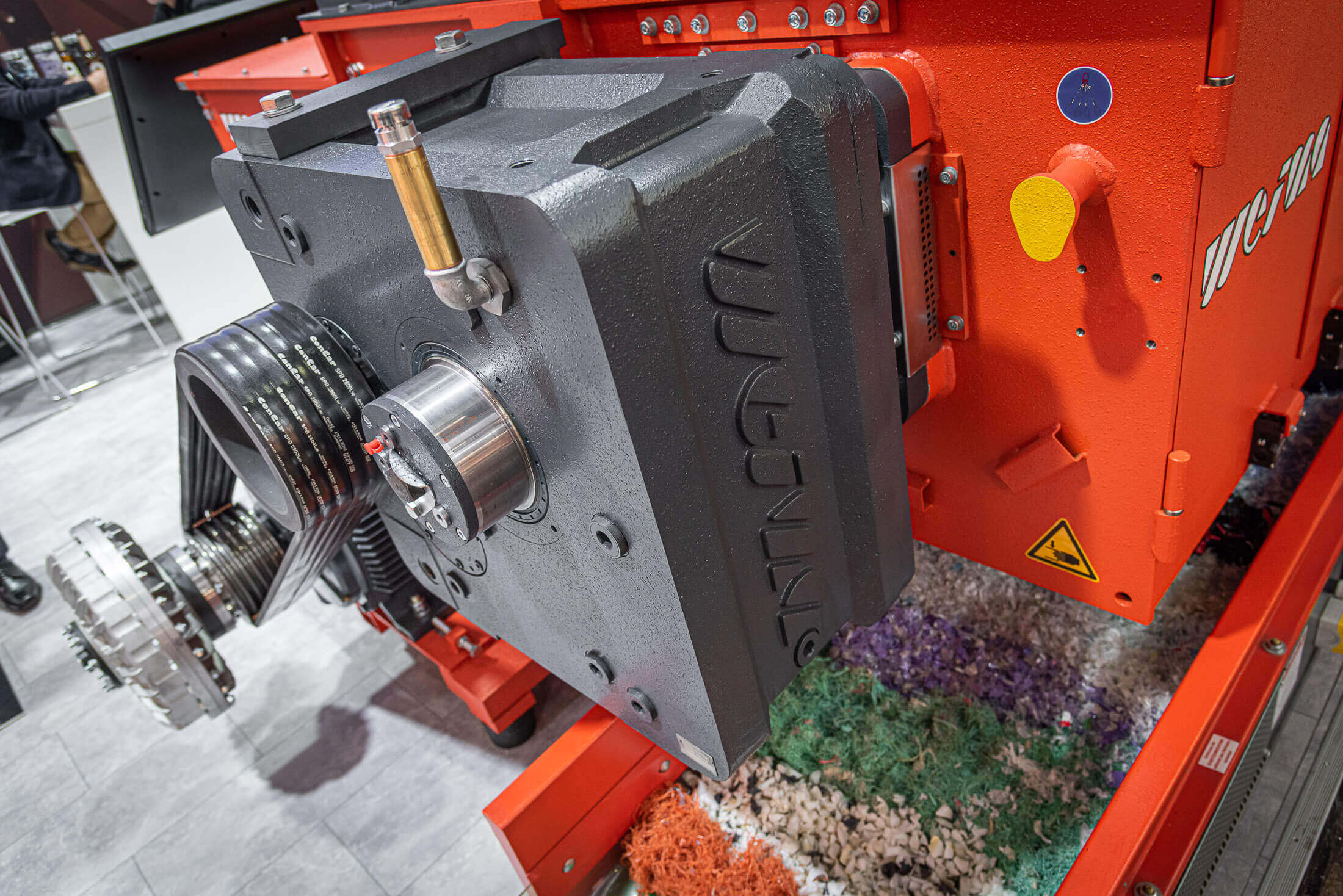 grey weima gearbox attached to an orange weima shredder