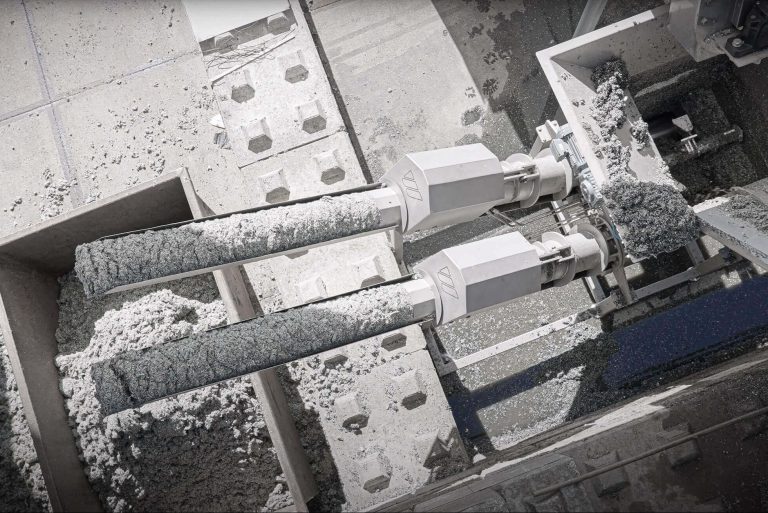 two puehler press discharge pipes with plastic material