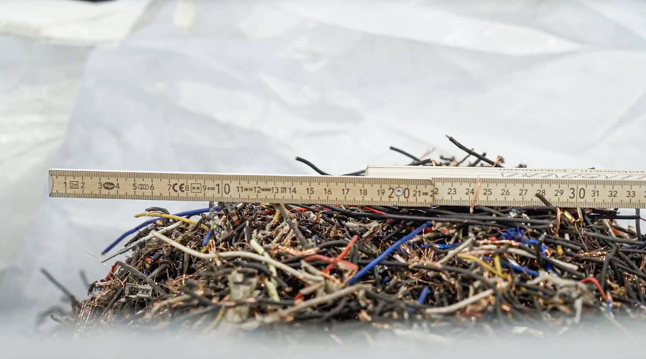 Shredded copper cables after a machine trial