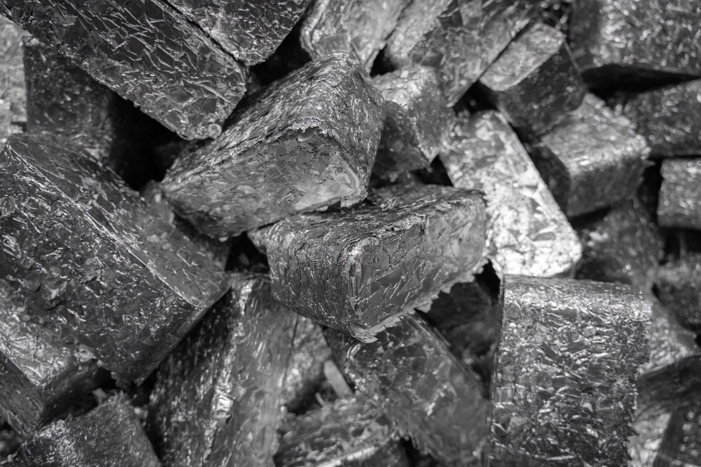 A mountain of silver aluminium briquettes from the TH 1500