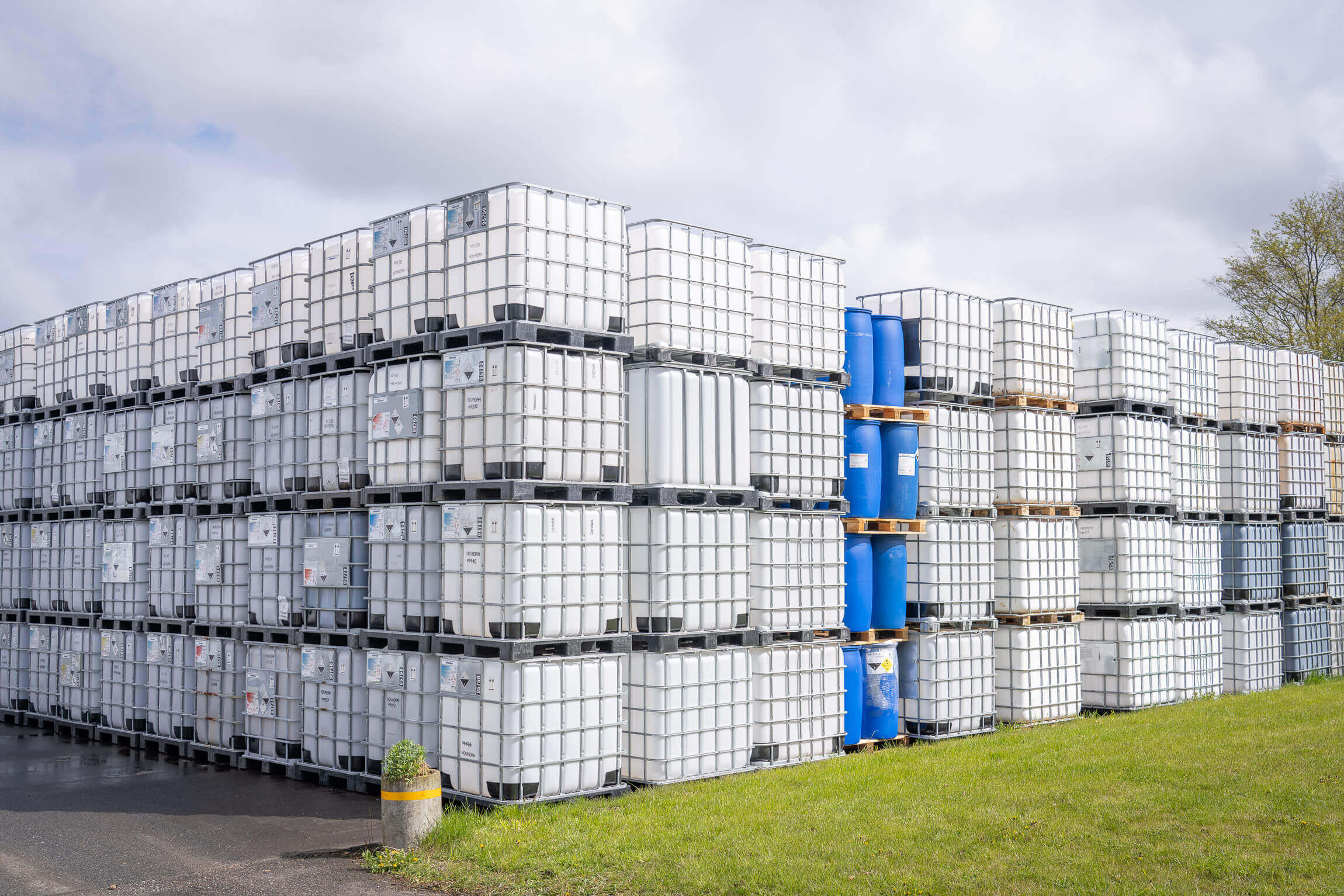 Stacked containers standing on the Dansk Emballage premises in Denmark