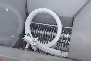 View into the cutting chamber of a ZM 40 4-shaft shredder during shredding
