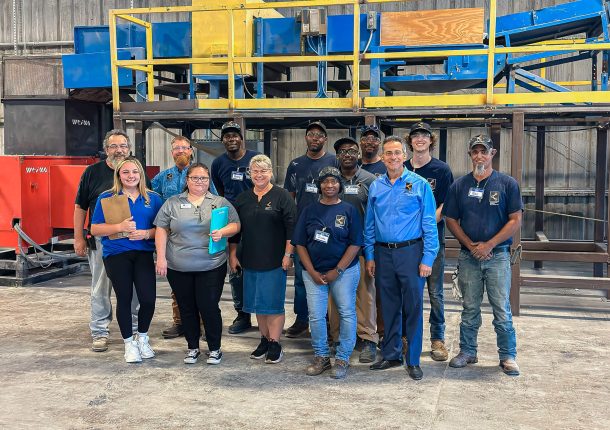 Group photo of employees at Mississippi location of commercial plastics recycling inc.