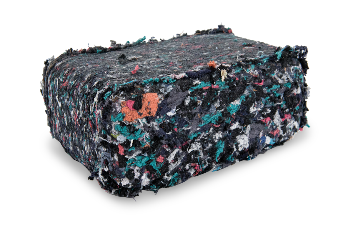 Briquette made from shredded textiles